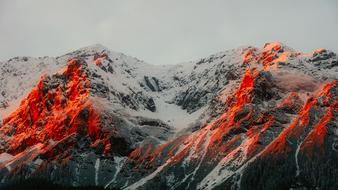 Beautiful landscape of the snowy mountains in Austria, at colorful and beautiful sunset