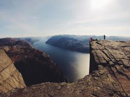 person on Cliff at sea, norway