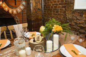 flowers and candles as decoration on the table