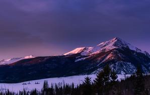 Colorado Mountains and Meadow at sunset