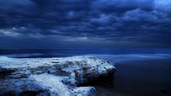 blue twilight over the ocean coast