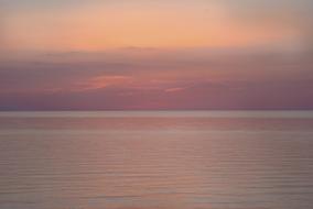 orange purple sky above water