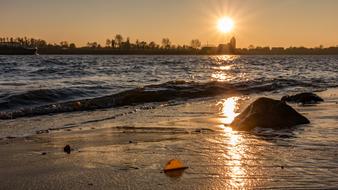 Beautiful beach of the Elbe river, with rocks, in Hamburg, Germany