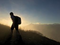 Silhouette Man on Mountain