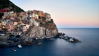 Beach Boats and City on cliff