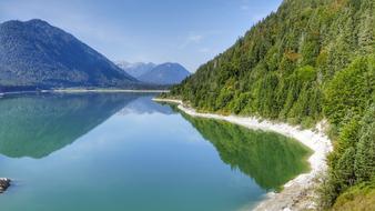 lake in the mountains of bavaria on a sunny day