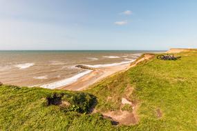 green cliffs near the sea
