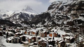 Beautiful landscape of the snowy Zermatt among the mountains, in Switzerland, in the winter