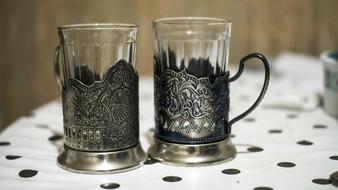 Beautiful glasses in the patterned, retro holders, from the Soviet Union