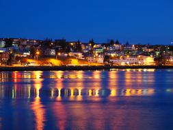 Beautiful port of HafnarfjÃ¶rÃ°ur, Iceland, with the colorful lights, at dusk