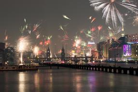 fireworks over waterfront of City, germany, berlin