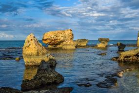 Beautiful landscape of the seashore with rocks, in the water with ripple, in Kapparis, Cyprus