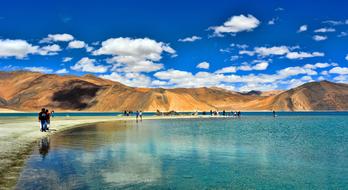tourists on pangong lake
