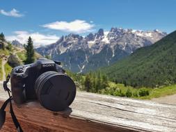 camera overlooking a picturesque mountain landscape