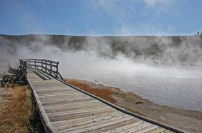 fog over the river near the wooden bridge