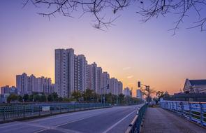 road in a modern city in blue twilight