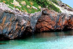 colorful cliffs on greece mediterranean coast