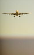 Plane Land Airport in a blurred background