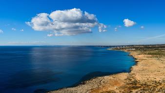 panoramic views of the endless expanses of water on cavo greko