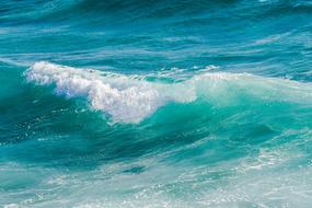 spray, turquoise ocean waves