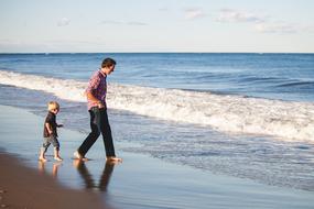 Boy and Kid on Beach