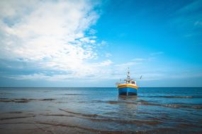 Fishing Boat by the sea near the coast