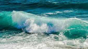 turquoise water crushing wave close up