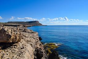 Beautiful and colorful, rocky coast of Cavo Greko, Cyprus, Greece, in sunlight