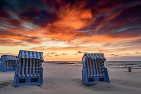 Beach chairs at Sunset