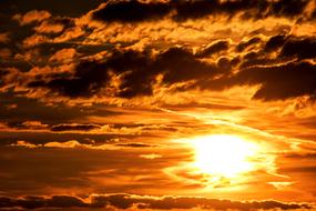 sunset in gray clouds
