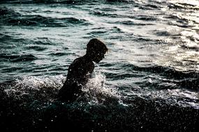 Swimming Boy in Water