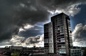 contemporary city beneath stormy Clouds