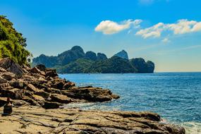 scenic rocky coast at blue sea, thailand, phi phi islands