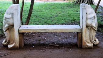 bench decorated with elephant heads in Sri Lanka