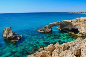 natural stone arch on the coast of cyprus