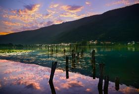 Sunset mirroring on Lake at shore