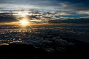 Beautiful landscape with the colorful sunset in clouds