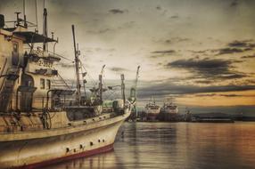 Fishing Boat on water in Port at sunset, japan, shizuoka