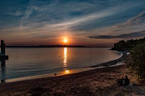 sunset over the bank of the river Elba
