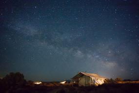 starry night sky over camping