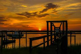 pier on riverside at Sunset