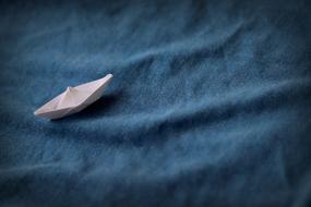 Small paper boat Sea Blue