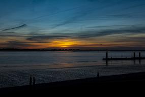 Beautiful beach of the sea, at colorful and beautiful sunset, in the evening