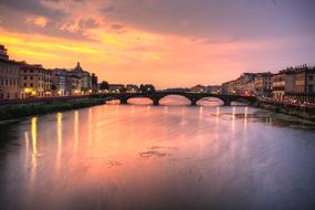 distant view of the city bridge at dusk