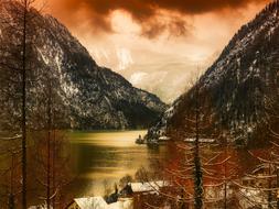 Beautiful landscape of the ravine with water, among the mountains in Austria, at colorful and beautiful sunrise