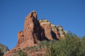 Beautiful and colorful mountains with green plants in sunlight, in Arizona, USA, under the blue sky