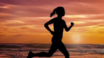 Running girl silhouette on seaside at Sunset, digital art