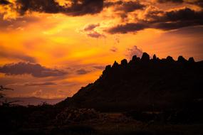 Beautiful landscape with silhouette of the mountain in Kenya, Africa, at colorful and beautiful sunset with clouds