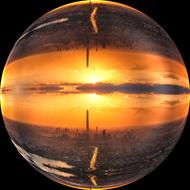 glass ball with a picture of a sunset