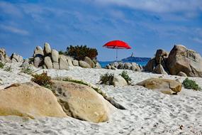 Red Sun Parasol on beach